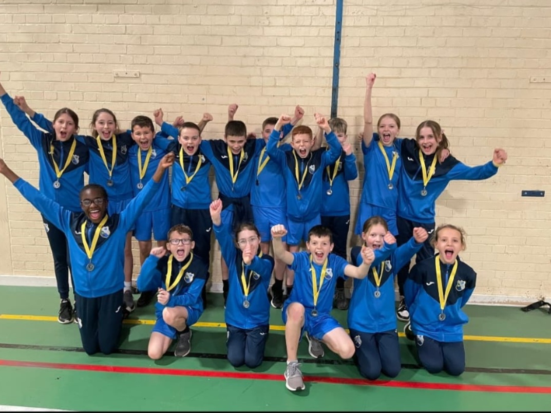 Law Primary School Pupils In Tracksuits Provided By LAW PTA