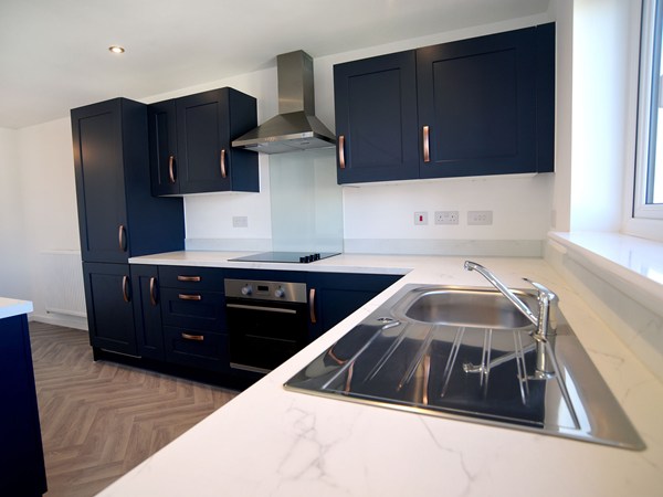 Close-up view of the modern kitchen in the Brampton at Trehenlis Gardens.