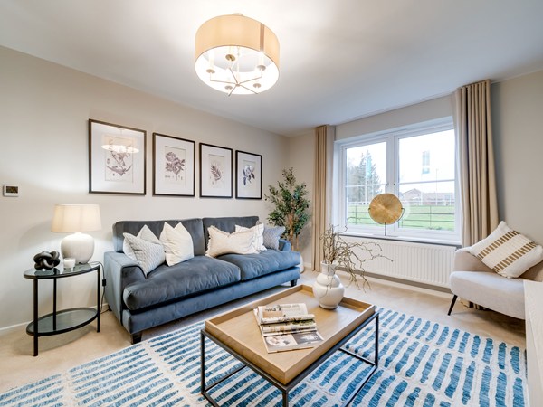 Kielder living room with blue sofa, armchair and coffee table