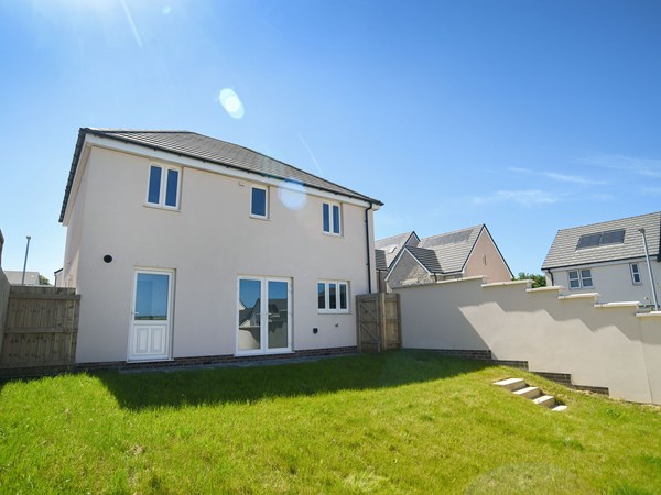 Rear garden view of the Brampton new build home at Trehenlis Gardens.
