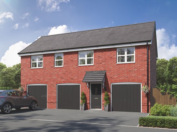An exterior shot of a red brick coach house with three garage doors against a blue sky. 