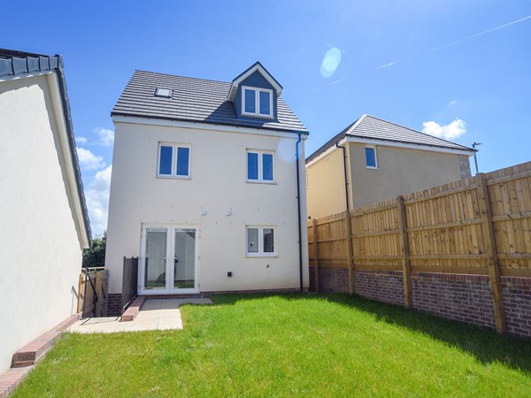 Rear garden view of the Greenwood new build home at Trehenlis Gardens.