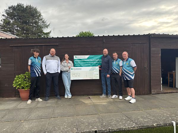 Newburgh Bowling Club receiving Persimmon donation