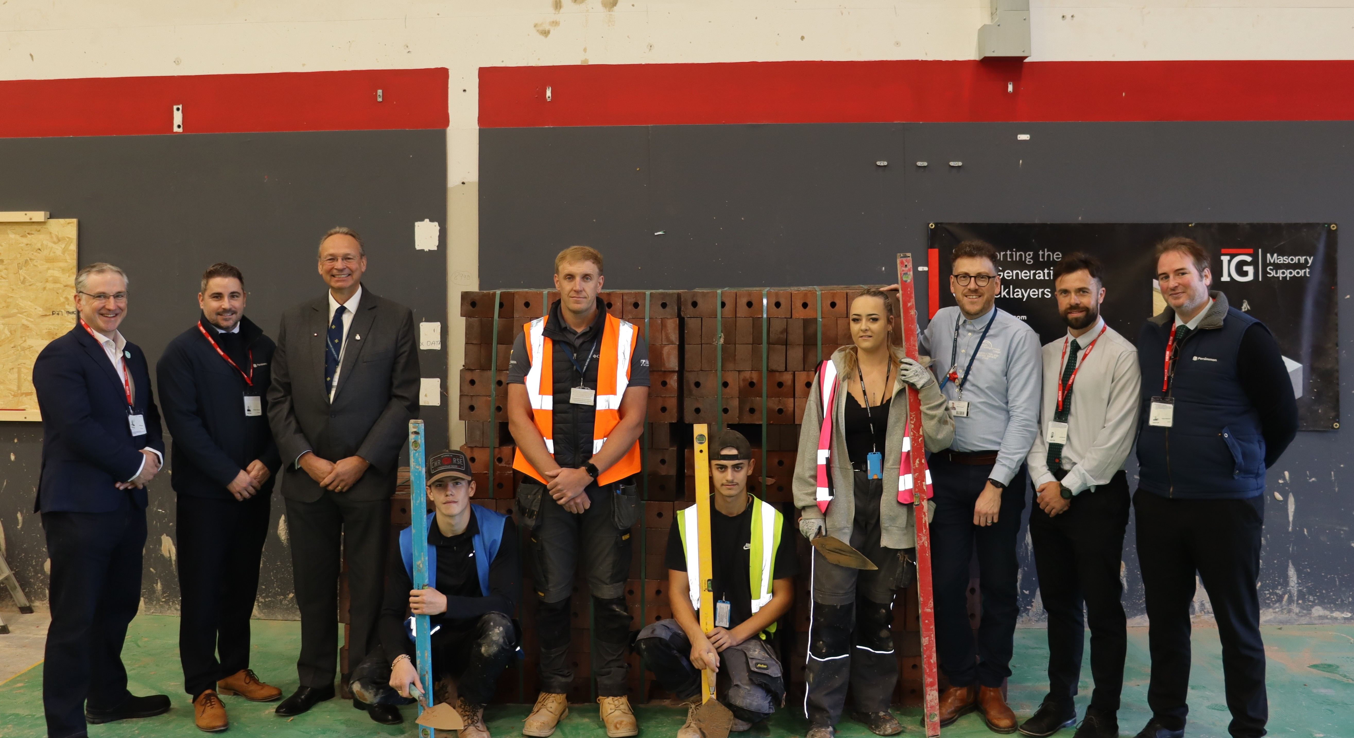 A college is celebrating after receiving a donation of 18,000 bricks