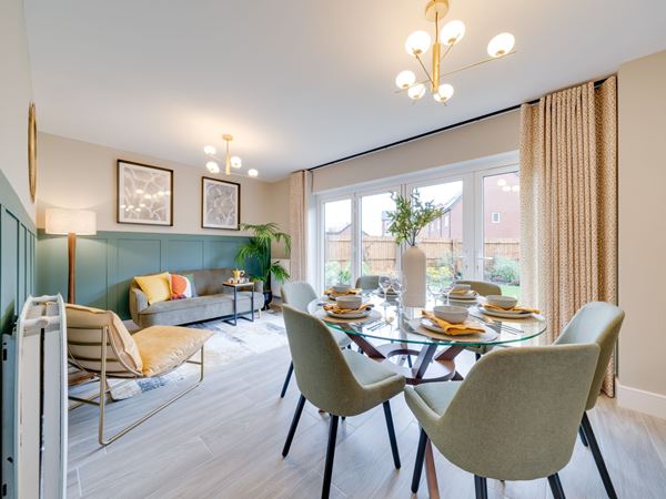 A beautiful, modern dining room in a modern Persimmon home.