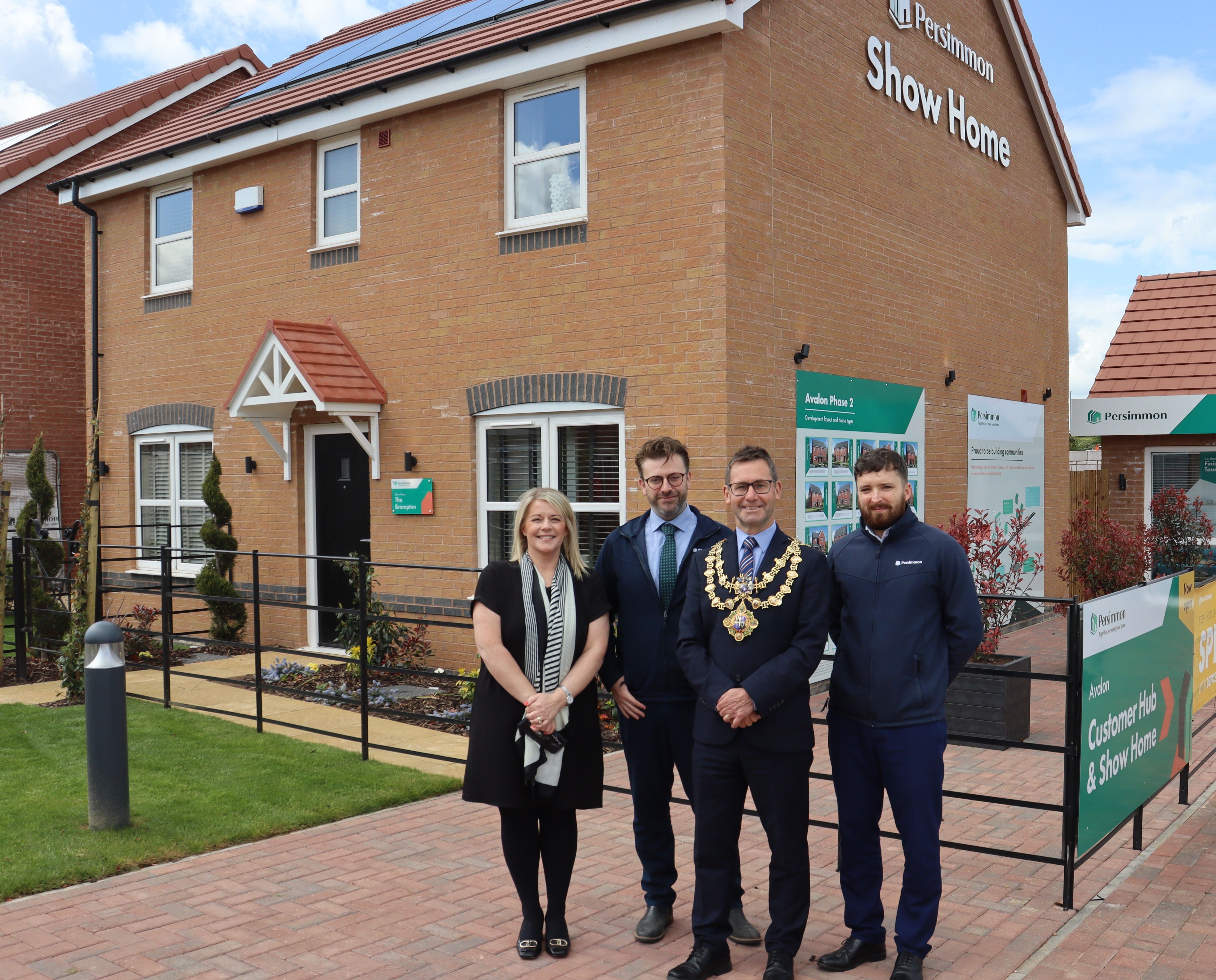 Mayor of Mansfield and Persimmon team in front of the new Avalon show home