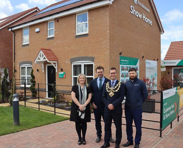 Mayor of Mansfield and Persimmon team in front of the new Avalon show home
