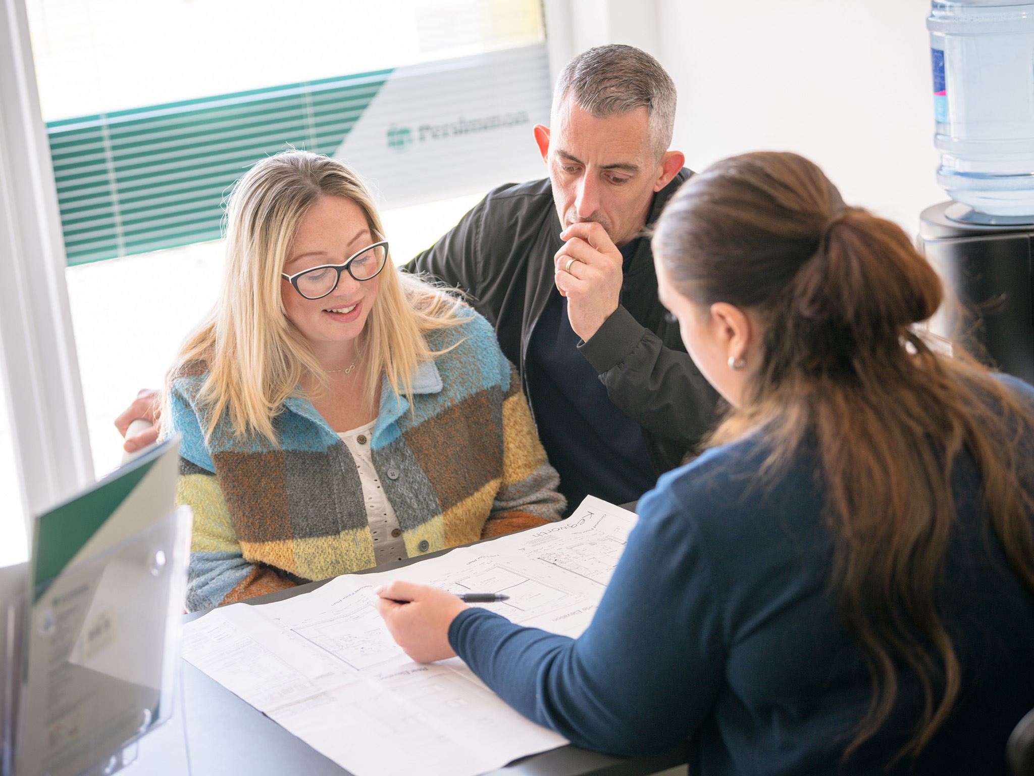 Couple talking to Persimmon sales advisor
