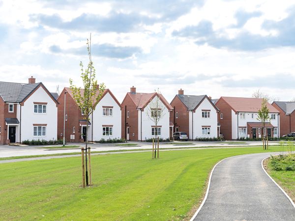 Street scene of a road at Kett's Meadow development