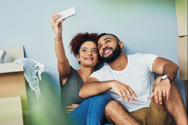 Couple Taking a Selfie in their New Home