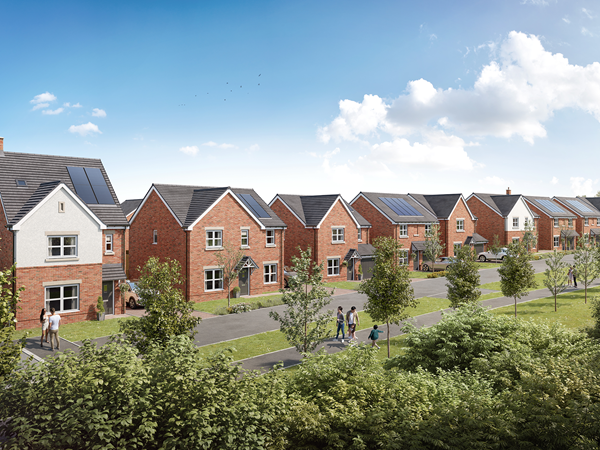 Row of modern red‑brick houses on a sunny street with trees, paths and people walking, viewed from a green landscaped area.