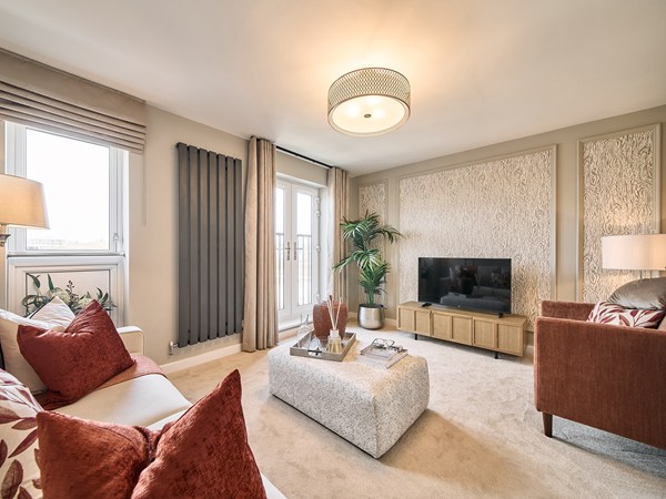 Contemporary-living-room-with-plush-seating-textured-feature-wall-TV-unit-and-French-doors.